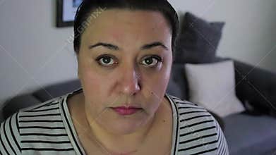Sad mixed race woman