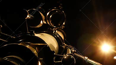 Antique astronomy telescope looking at the stars.