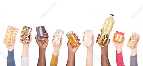 Food donations in hands isolated on white background