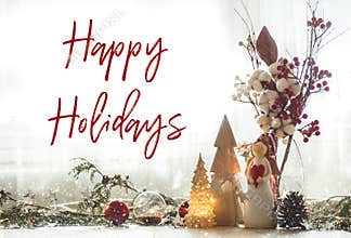 Ready to postcard Happy Holidays. Christmas festive decor still life on wooden background, concept of home comfort and holiday