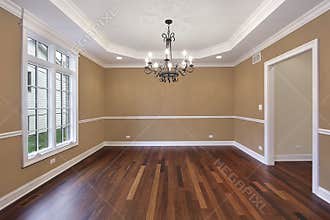 Dining room with tan walls