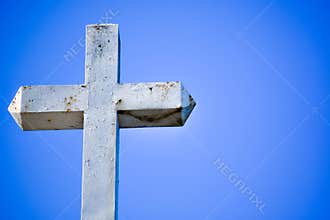 White Cross Against Blue Sky
