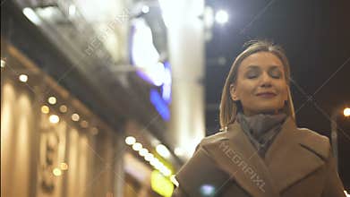 Happy woman going to buy x-mas gifts to her family, holidays and good mood