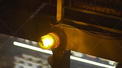 Emergency light or Flashing beacon. Orange flashing on wall