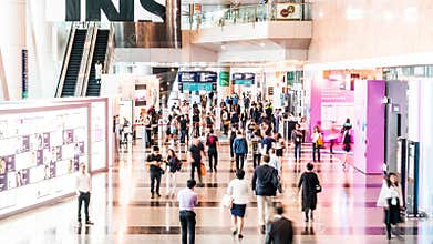 4K UHD Time-lapse of crowded people walking at exhibition hall entrance. International tradeshow expo event concept