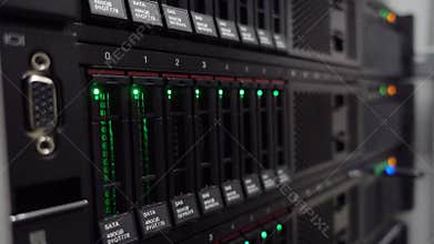 Servers stack with hard drives in a datacenter for backup and data storage