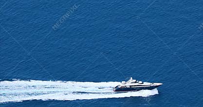 Aerial View Of A Fast Luxury Yacht Wake