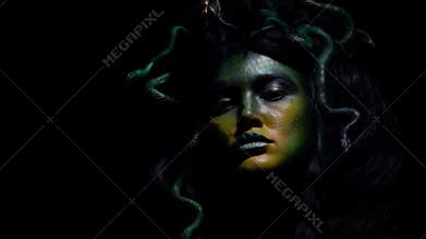 Scary Medusa Gorgon with her blade, close up