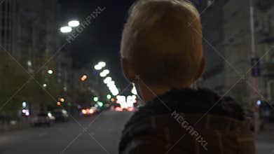 Lost kid standing alone on street, police patrol searching for missing child