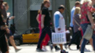 Side view blurry pedestrians walking.Time Lapse.