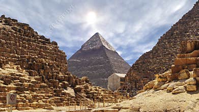 Time lapse with clouds over great pyramids at Giza Cairo in Egypt - Zoom In of Stone Pyramid