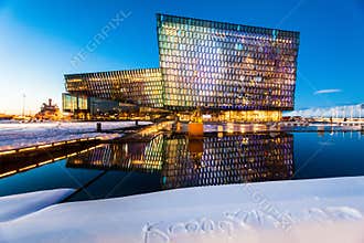 Harpa Concert Hall view during blue hour which is a concert hall and conference centre in Reykjavik, Iceland