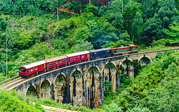 View on Train passing over Nine Arches Bridge in Ella, Sri Lanka