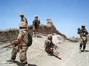 Soldiers clearing the area