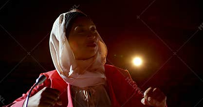 Businesswoman with hijab speaking in business seminar at auditorium 4k