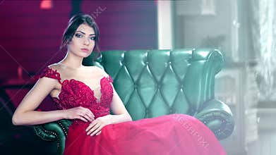 Medium shot beautiful fashion woman wearing glamorous dress flirting and posing looking at camera