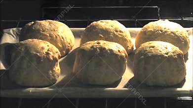 Time lapse home baking cooking cookery cakes scones in oven