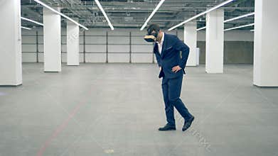 One businessman wears VR glasses while working, augmented reality.