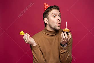 People, joy, fun and happiness concept. Relaxed happy birthday guy looking cheerful, smiling happily, posing for picture
