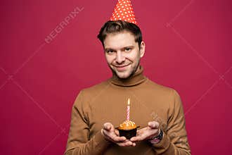 People, joy, fun and happiness concept. Relaxed happy birthday guy looking cheerful, smiling happily, posing for picture