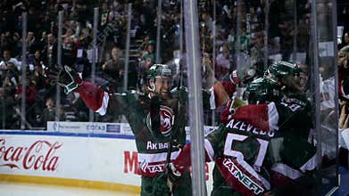 Slow motion hockey team attacks and goals to opponents gate