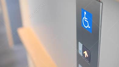 Female Finger Pressing Elevator Lift Button for the Disabled in Shopping Mall or Hospital. 4K, Slow Motion.