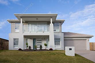 Modern two storey house with a balcony