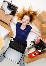 Pretty young woman using online stores