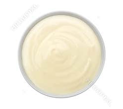 Sour cream isolated on white background. Top view