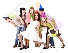 Group of teenagers celebrate birthday.