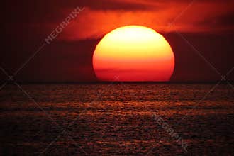Sun on sea horizon