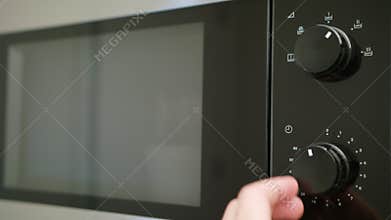 Heating a Container with Food in a Microwave Oven