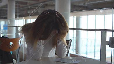Young blonde girl was late for plane