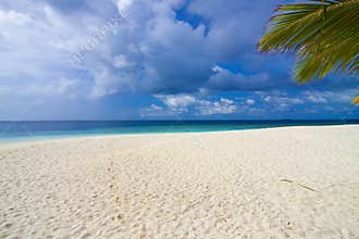 White sand beach and blue sky