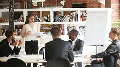 Businesswoman making offer to diverse partners, presenting project to clients