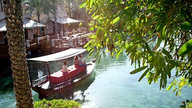 DUBAI, UNITED ARAB EMIRATES, UAE - NOVEMBER 20, 2017: Hotel Jumeirah Madinat ,day Arba boat trip on the water canal , in