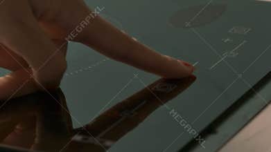 Woman Switches on Modern Electric Kitchen Range