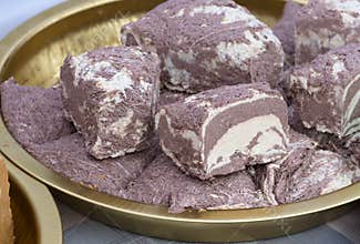 Marble sesame halva with cocoa, bowl of halava sweets