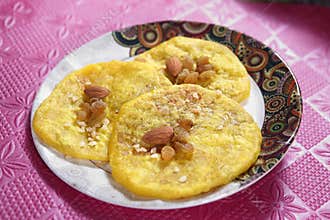 cream stuffed flat bread. paladai poli. cream. flat bread. paladai. poli. puran poli. puran roti. holige. obbattu. obbattlu.