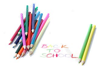 Back to school sign with crayons