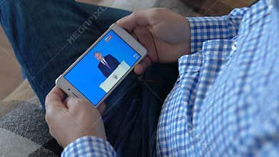 Man watching The President Putin