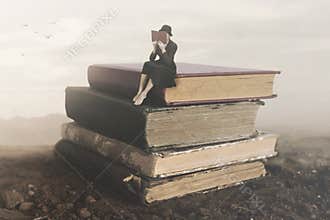 Surreal image of a woman reading sitting on top of a book