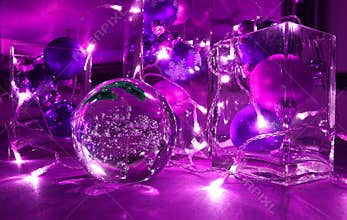 Christmas tree balls and jewellery with candle-lighted rally, in trend colour Ultra violet