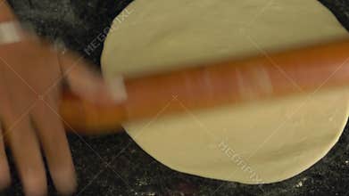 Indian chef prepares indian food. indian bread naan and roti in the oven