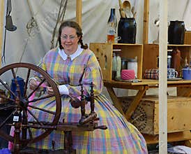 Holland Michigan, USA - September 2017: Civil War Reenactment woman seemstress