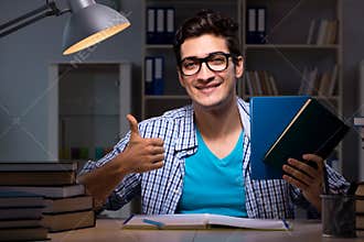The student preparing for exams late night at home