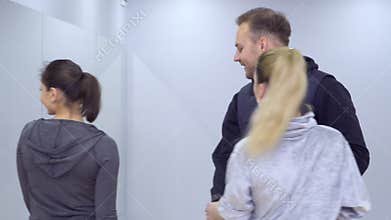 Young man stares at another woman and gets a slap in face from his girlfriend