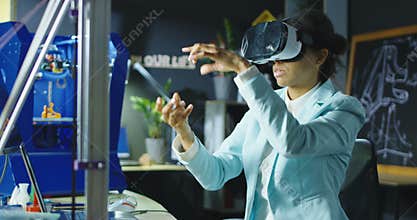 Scientist in VR glasses working in lab