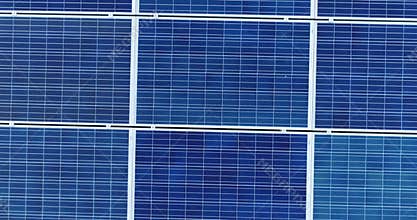 Aerial view of solar panels on the roof of villa