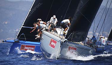 Crew at work during sailing regatta